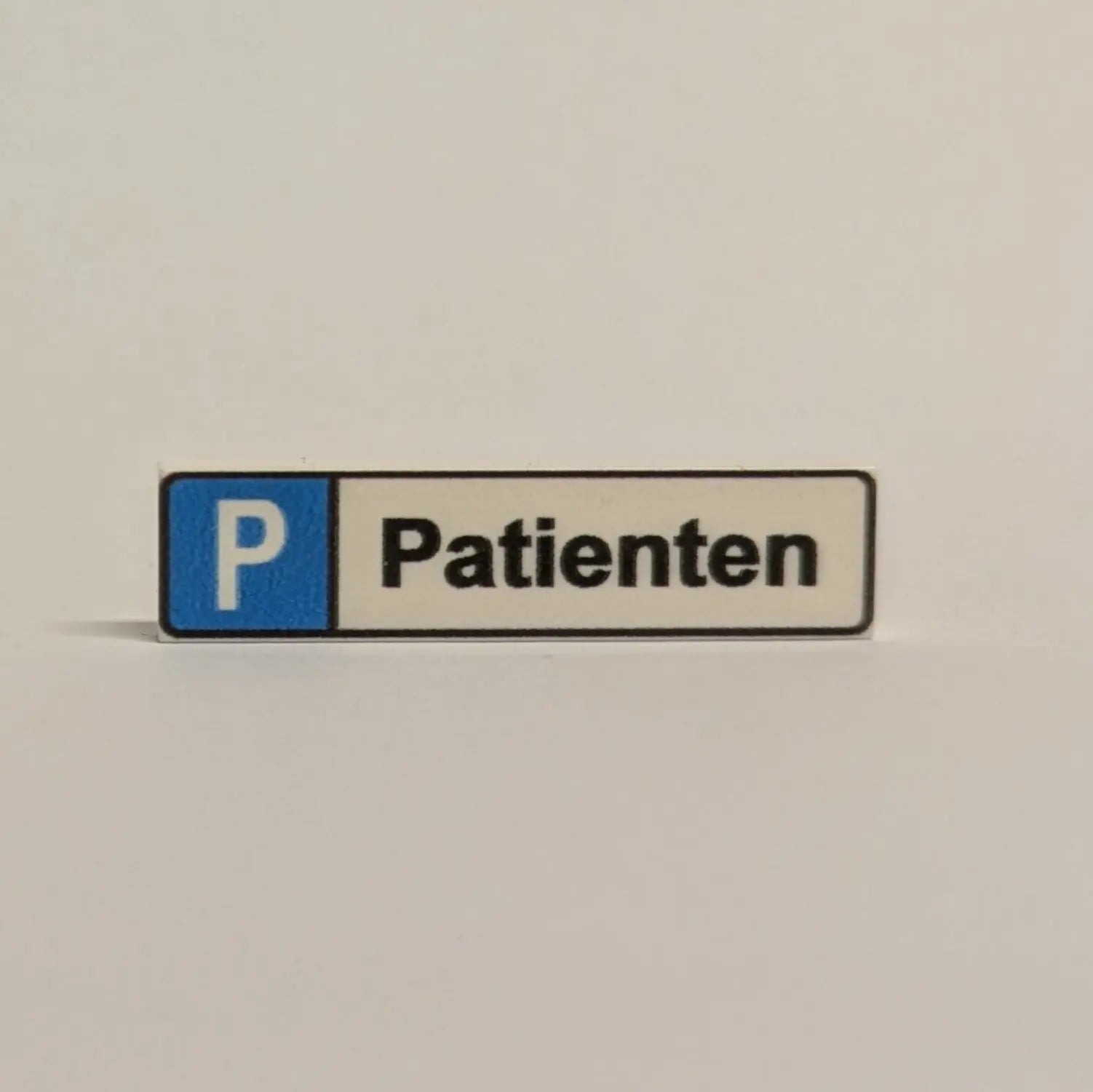 "Parking space sign" 1x4 tile for selection