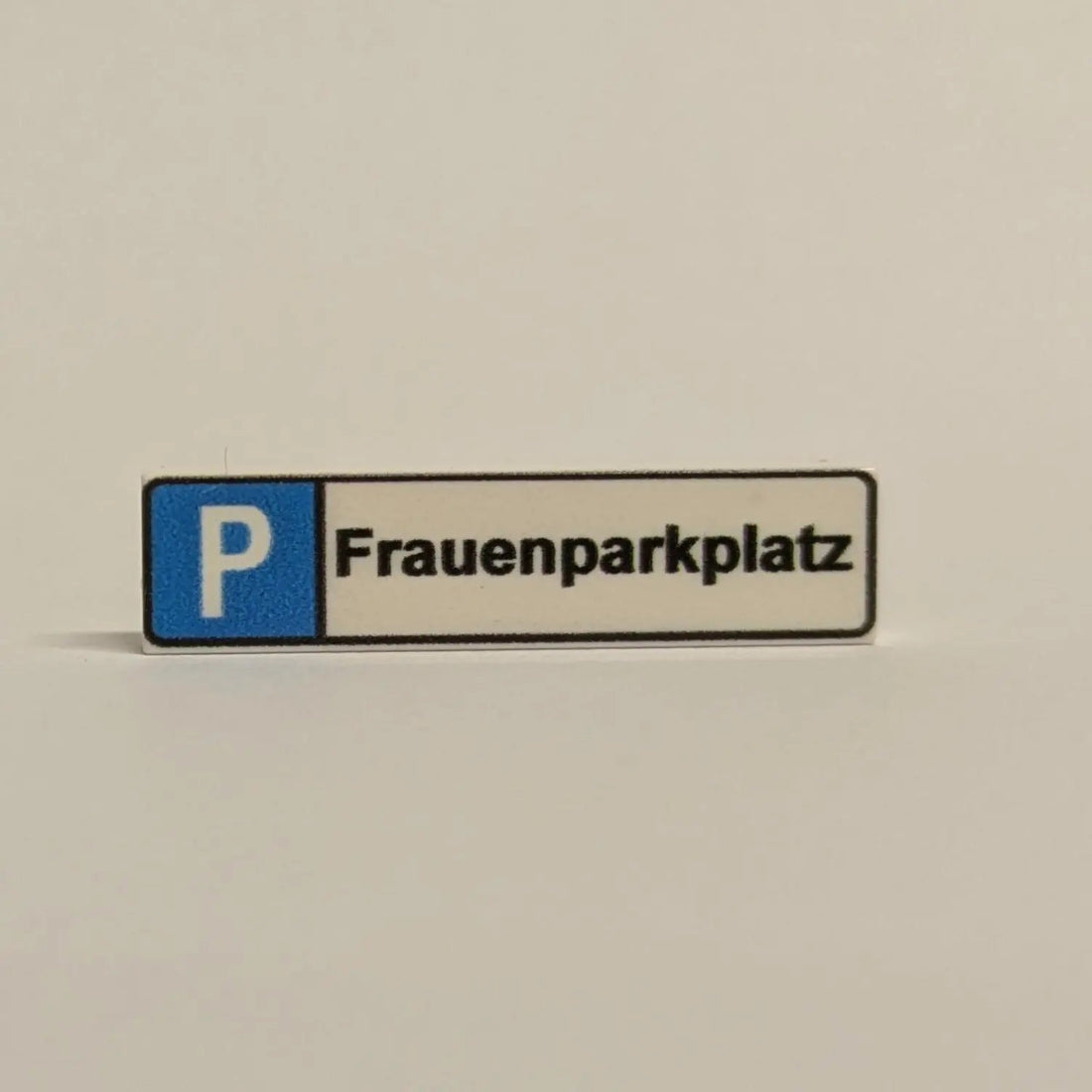 "Parking space sign" 1x4 tile for selection