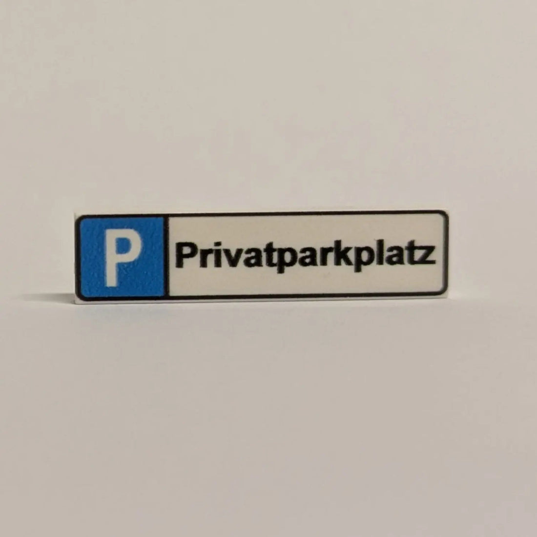 "Parking space sign" 1x4 tile for selection