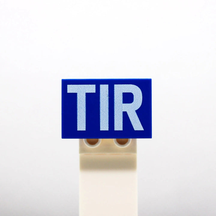 LEGO® Tile 2x3 Shield "TIR" – Blue, UV Printed (optionally crossed out) | Brickhunter.shop