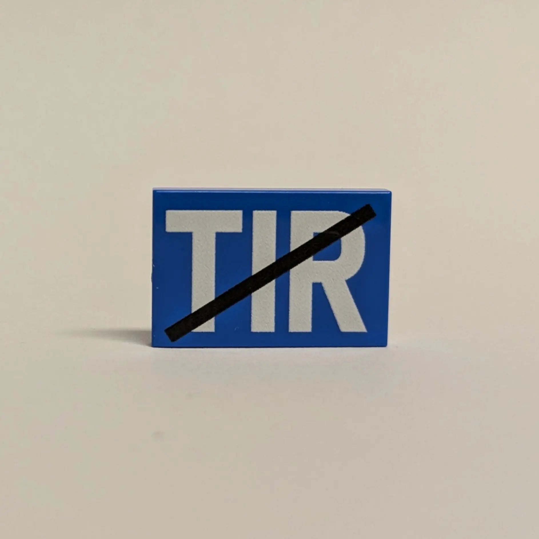 LEGO® Tile 2x3 Shield "TIR" – Blue, UV Printed (optionally crossed out) | Brickhunter.shop