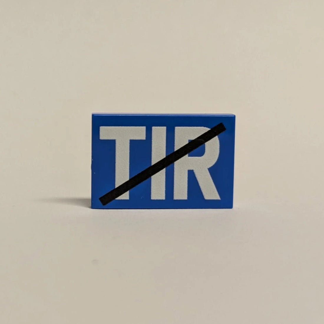 LEGO® Tile 2x3 Shield "TIR" – Blue, UV Printed (optionally crossed out) | Brickhunter.shop