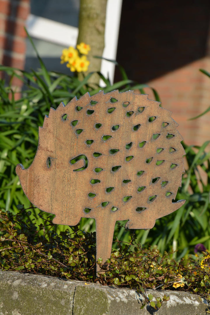 Large hedgehog as a plant stake